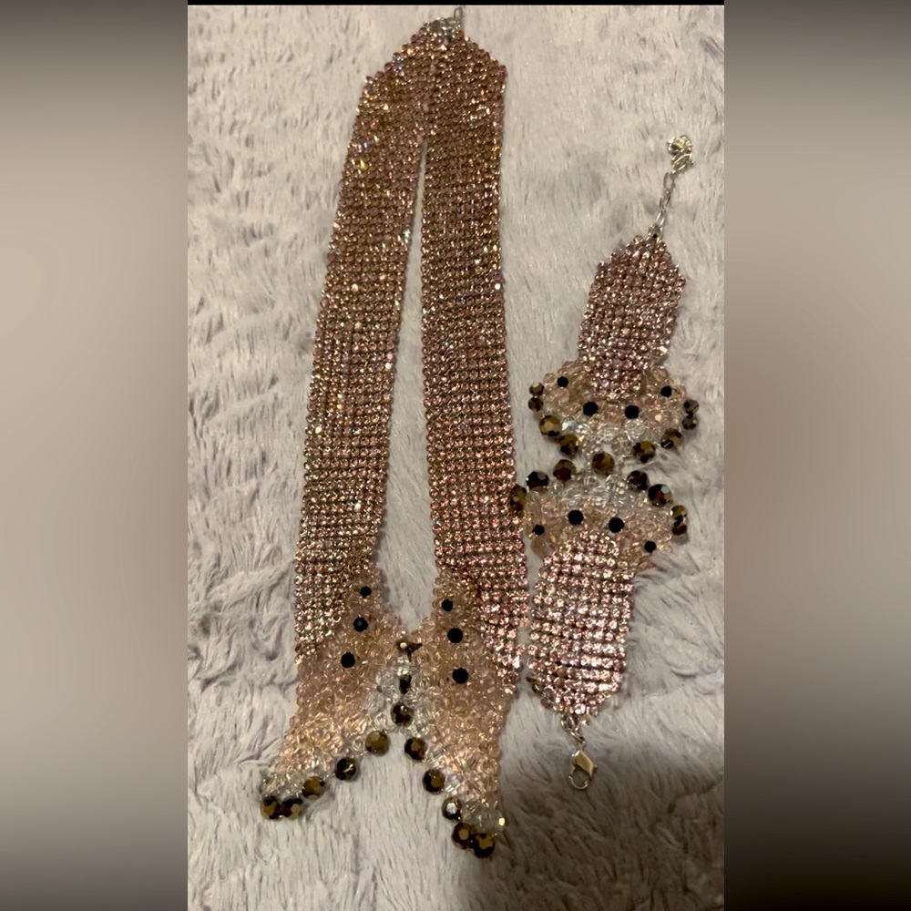 Beautiful butterfly Swarovski necklace and bracelet very light not heavy.